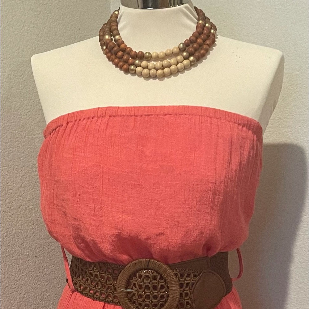 Beautiful strapless tangerine color summer dress.